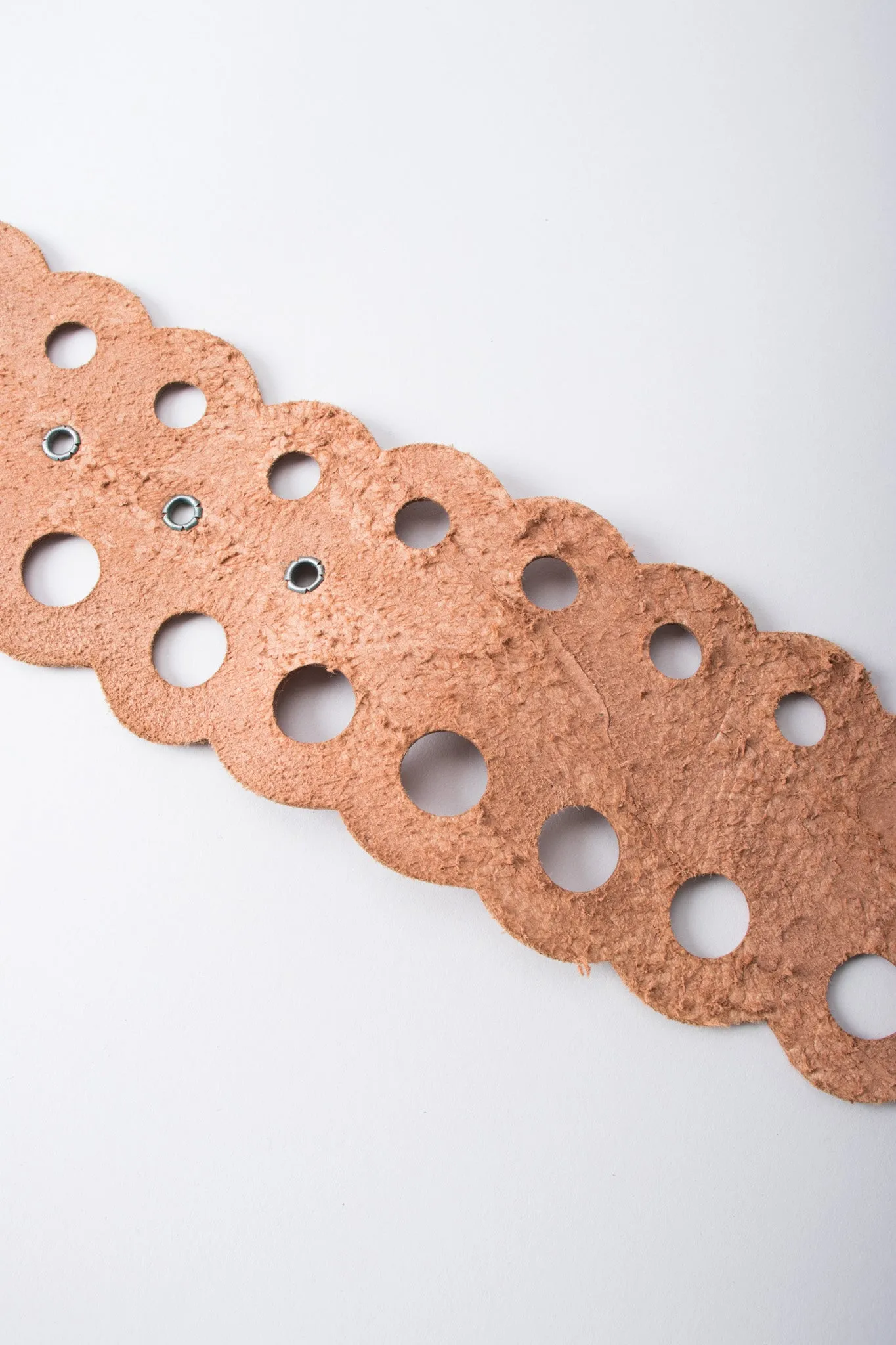 Grecian Eyelet Medallion Belt