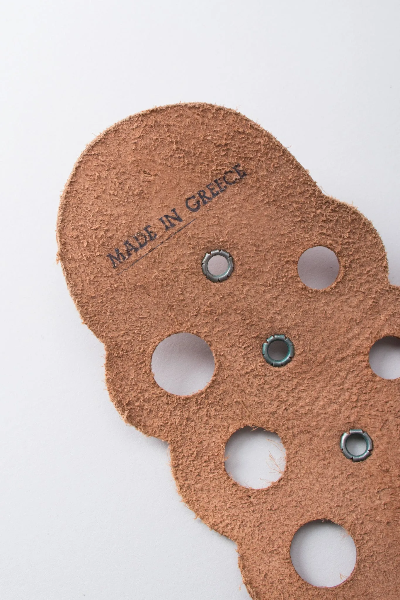 Grecian Eyelet Medallion Belt